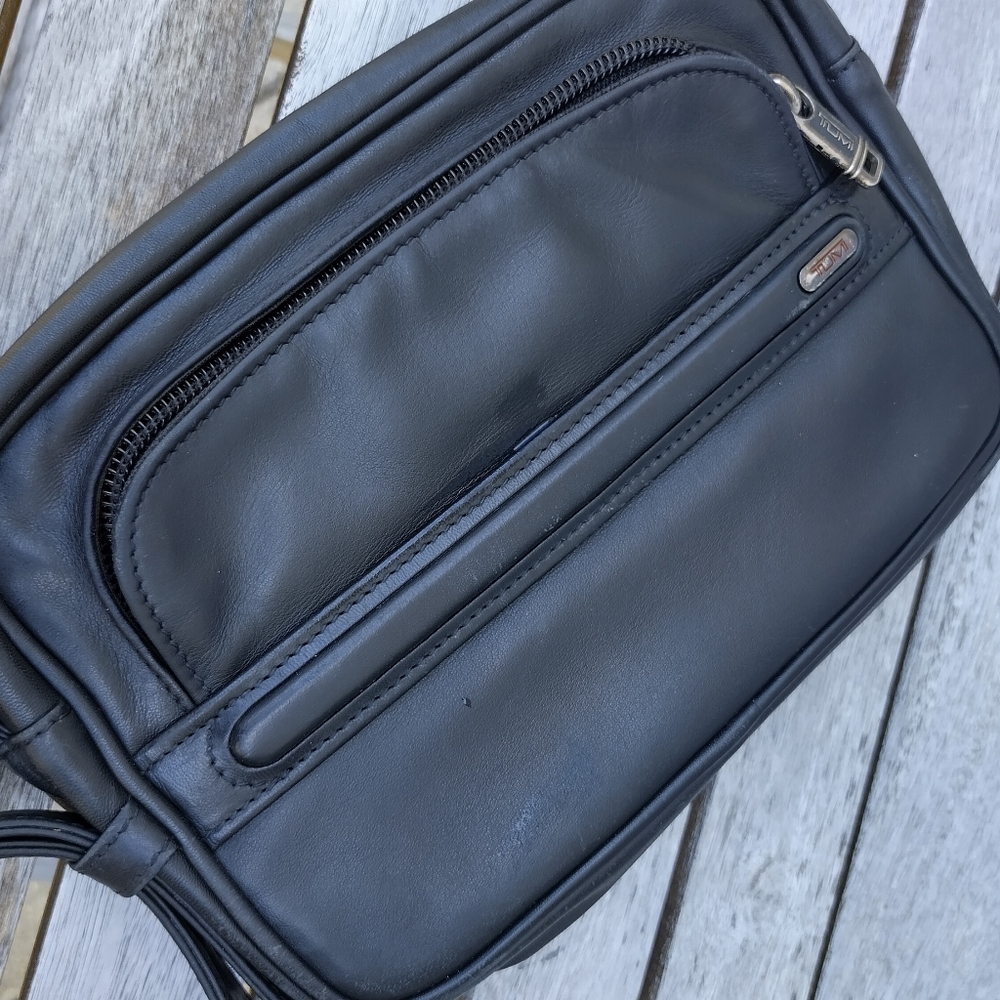 Tumi leather clutch bag